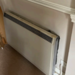 Full Circuit Electrical - Out Dated Living Room Storage Heater